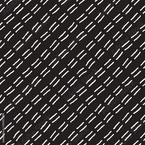 Hand drawn style ethnic seamless pattern. Abstract geometric tiling background in black and white. Vector freehand doodle texture.