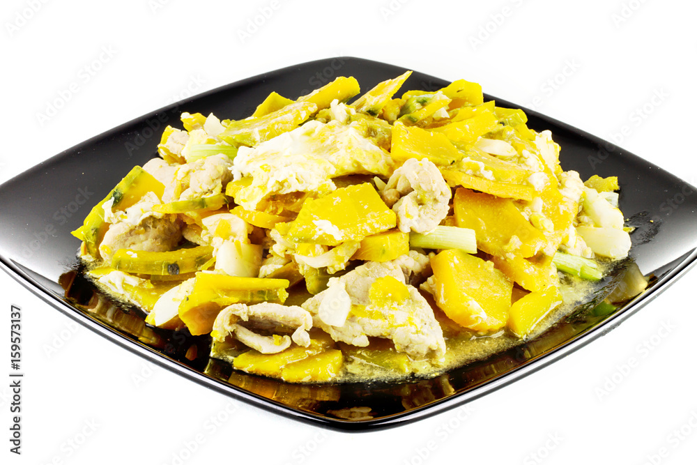 Stir Fried Pumpkin with Egg on white background ,Thai style food,healthy food Stir Fried Pumpkin with Egg on white background ,Thai style food,healthy food