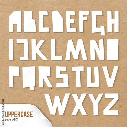 Fototapeta Naklejka Na Ścianę i Meble -  Rough uppercase characters cut out of paper. White capital letters. Vector paper ABC on cardboard background