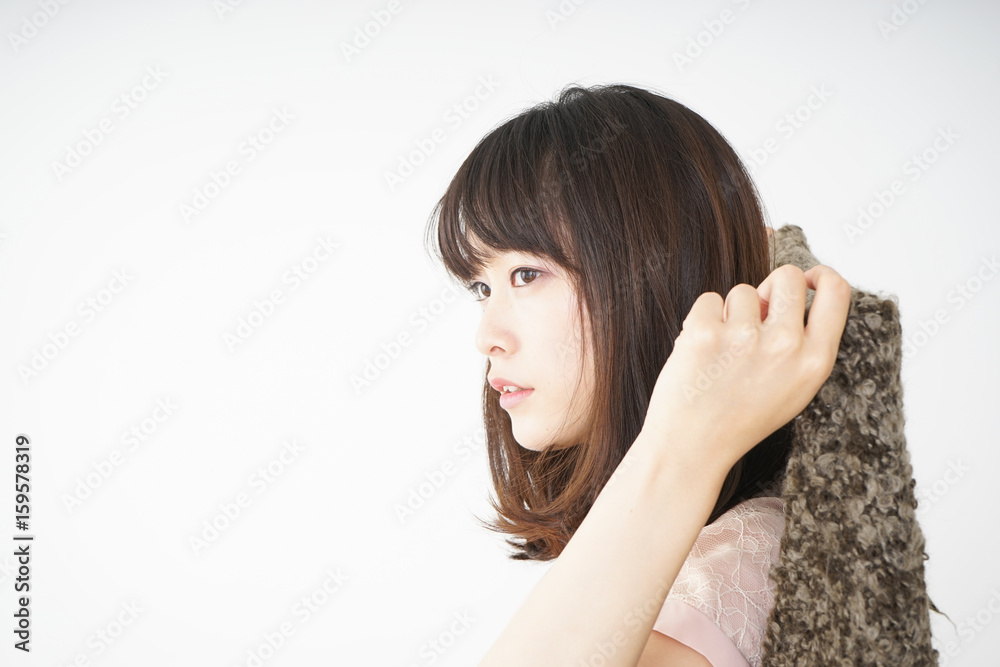 Young woman developing a fever because of a cold Young woman developing a fever because of a cold