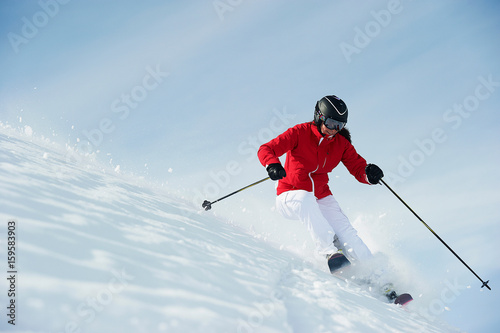 Skier going downhill