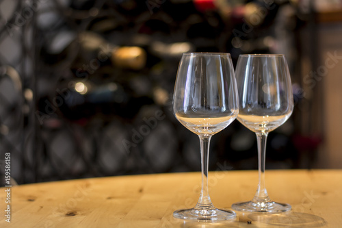 Empty wine glasses on a wooden plank