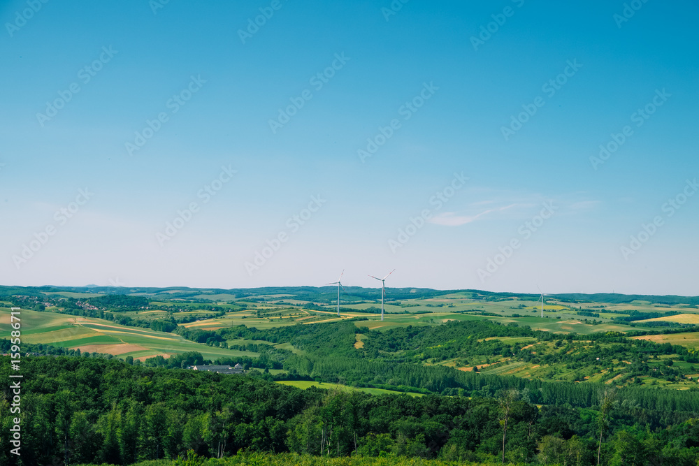 Wind turbines on the field