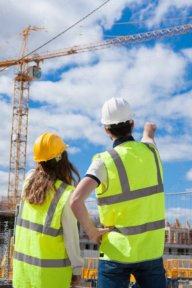 architects working on construction site architects working on construction site