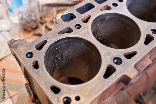 Close-up cylinder of old rusty engine