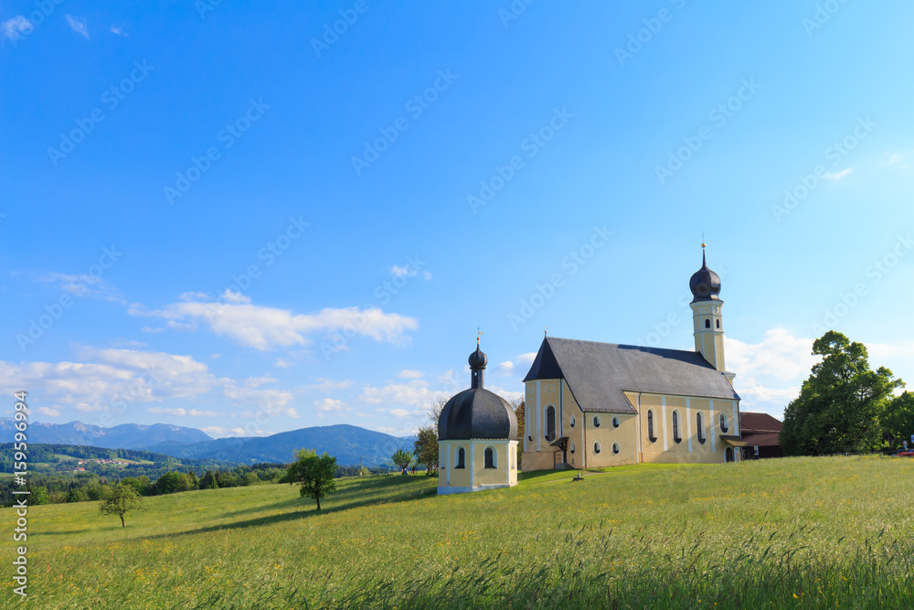 Church Wilparting in Bavaria on a sunny and cloudy day in summer