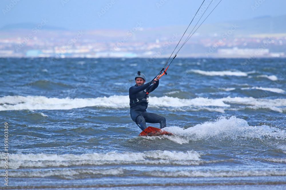 kitesurfer riding kitesurfer riding