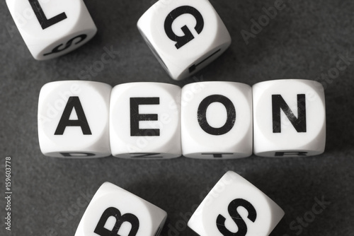 word aeon on toy cubes photo