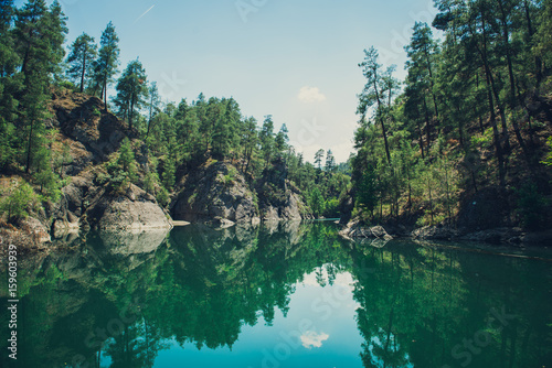 beautiful mountain river reflects the sky