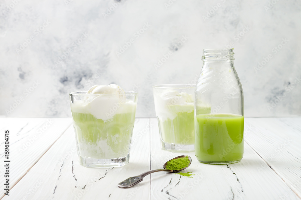 Preparing matcha green tea affogato with vegan coconut ice cream. Copy space