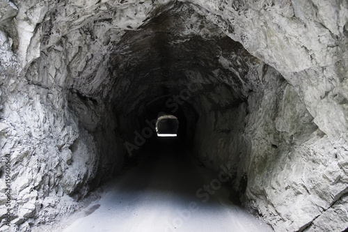 Diminishing perspective of tunnel in rock, Dornbirn, Vorarlberg, Austria photo