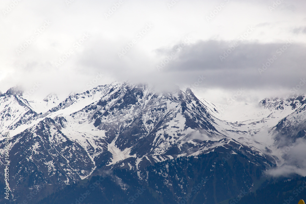 Mountain ridge with snowy peaks in Tien Shan