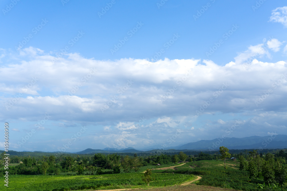 Green mountains with blue sky
