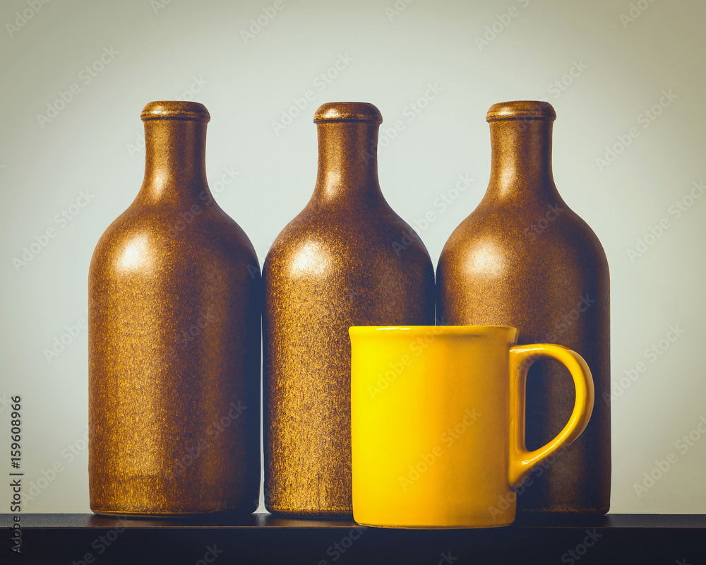 Ceramic bottles and a cup Ceramic bottles and a cup