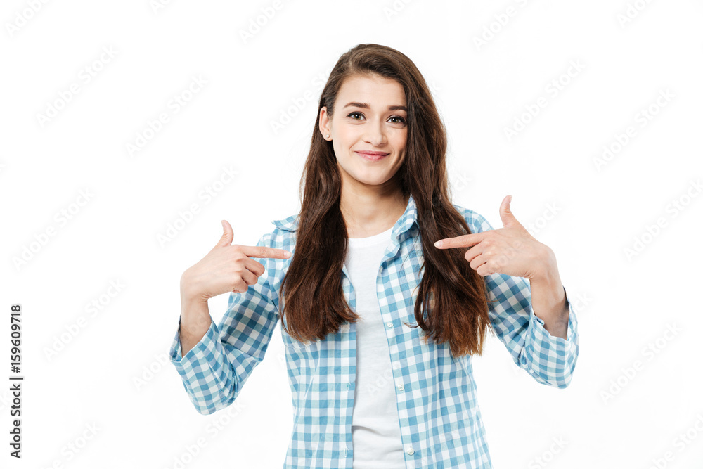 Young girl pointing at herself Young girl pointing at herself