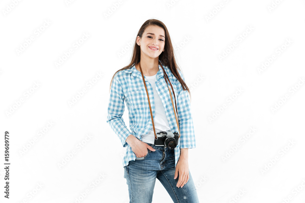 Portrait of a happy girl photographer standing with retro camera Portrait of a happy girl photographer standing with retro camera