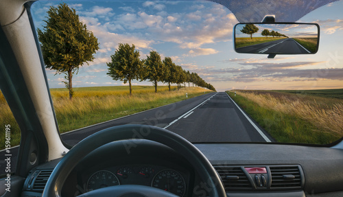 A view from the cockpit of a car driving on a country road © Mike Mareen