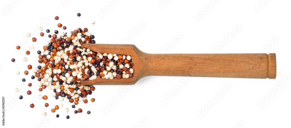 Obraz premium uncooked quinoa seeds isolated on white, top view