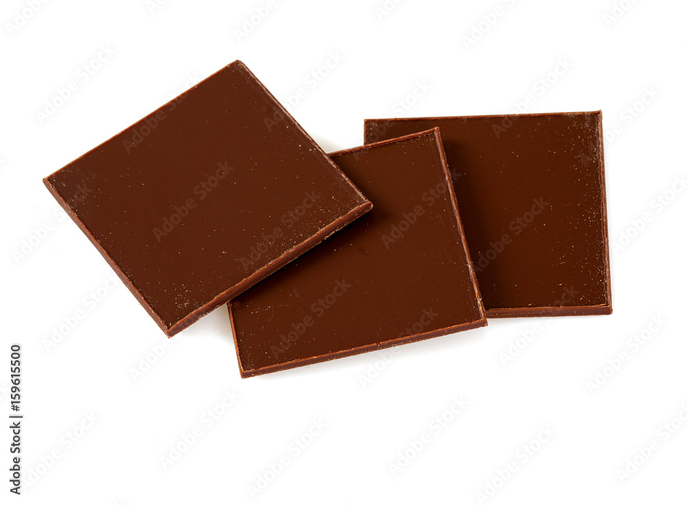thin pieces of chocolate isolated on white thin pieces of chocolate isolated on white