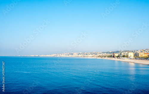Coast line along Mediterranean sea in Nice, favorite vacation city in France, under morning sunlight © jeafish