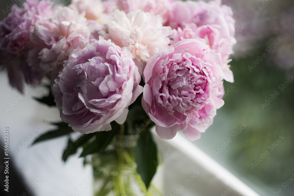 Amazing vibrant bouquet of blooming purple peonies. Amazing vibrant bouquet of blooming purple peonies.