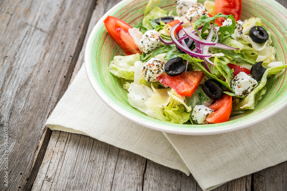 Greek salad with fresh vegetables, feta cheese Greek salad with fresh vegetables, feta cheese