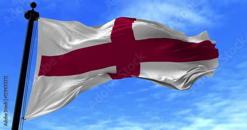 Close up England flag blowing in the wind, looped slowmotion, 4K photo