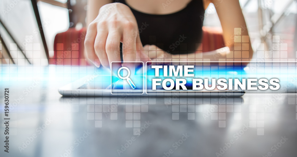 Woman using tablet pc and selecting time for business.