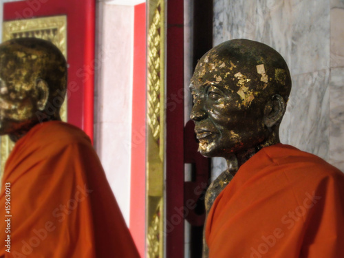 Statues of Buddhist monks. Statues in a Buddhist temple. 