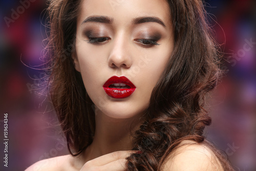 Beautiful woman with red li...