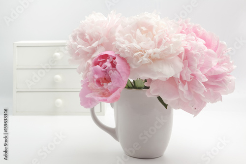 Fototapeta Naklejka Na Ścianę i Meble -  Beautiful pink Peonie flower on light background