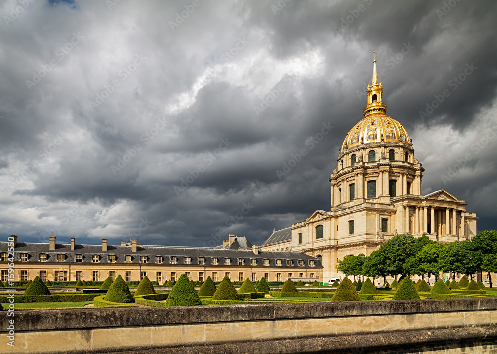 Dramatic sky over Les Invalides (The National Residence of the Invalids) in Paris, France.