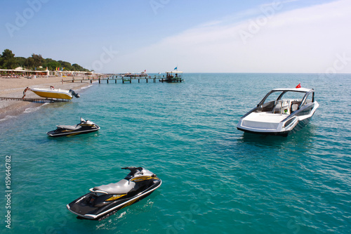 jet skis and boat on the beach © KVN1777
