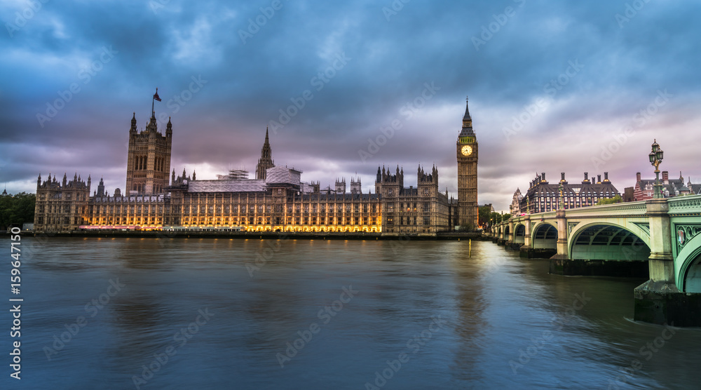 Fototapeta View of the Houses of Parliament and Westminster Bridge in London at sunset