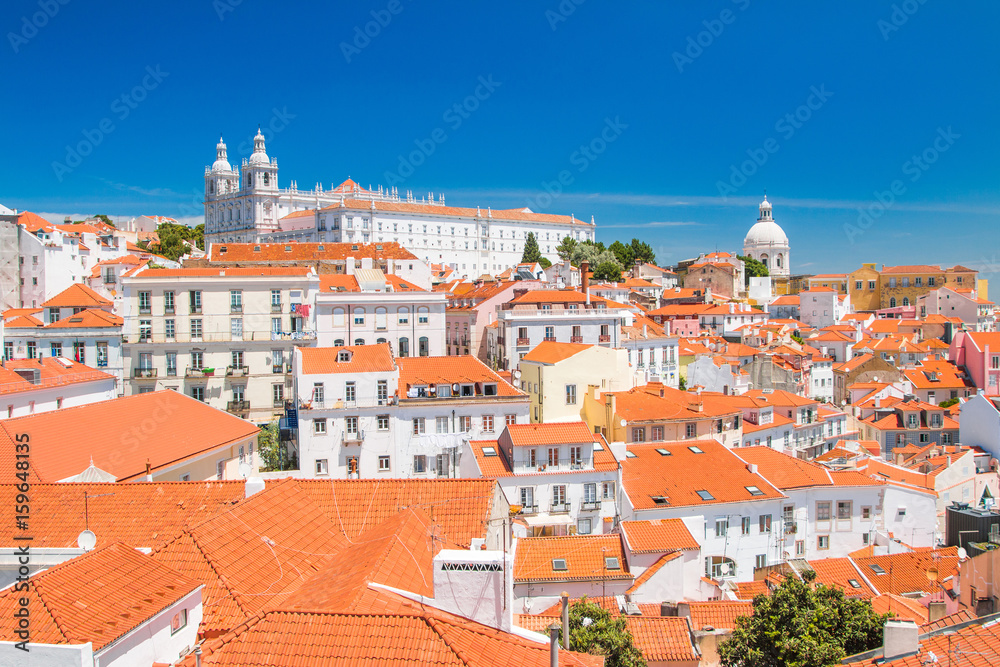      Aerial scenic view of central Lisbon Portugal with red tile roofs and monastery Igreja Sao Vicente de Fora 