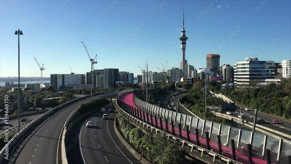 Urban landscape view of traffic on Auckland city motorway. Auckland is the most populous urban area in New Zealand. Urban landscape view of traffic on Auckland city motorway. Auckland is the most populous urban area in New Zealand.