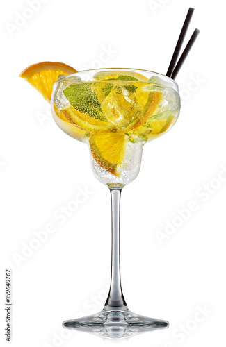 fresh fruit alcohol cocktail or mocktail in margarita glass with ice cubes, orange and mint isolated on white background