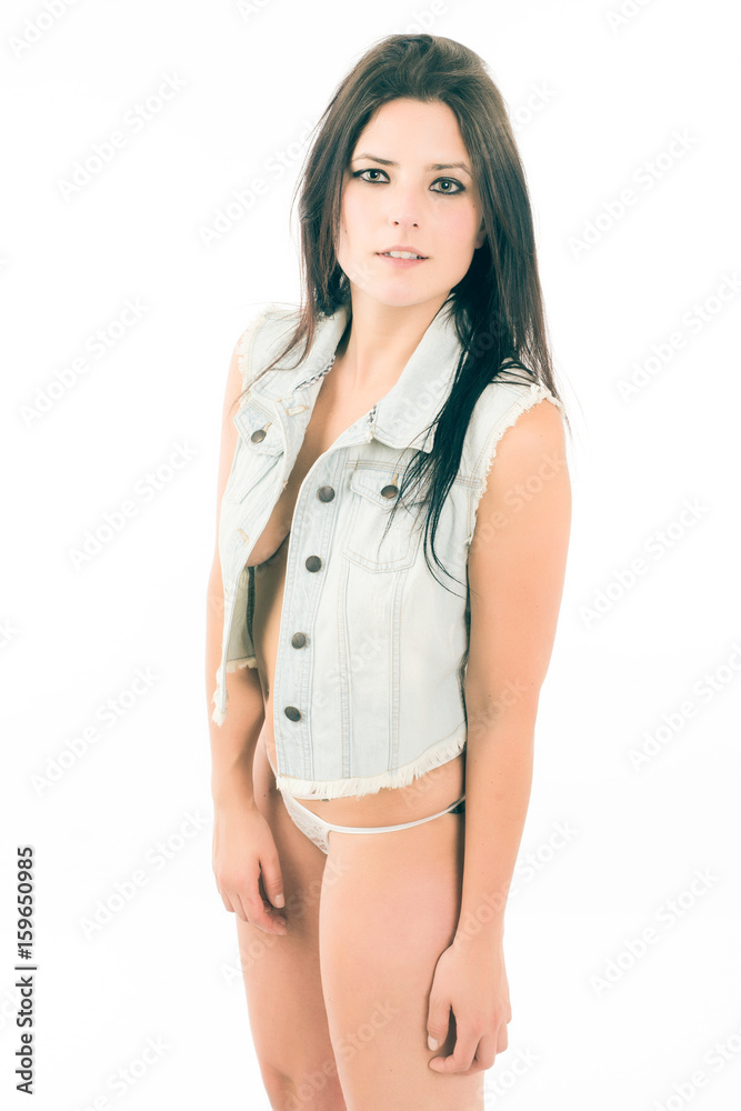 Young woman poses in white lingerie on white background Young woman poses in white lingerie on white background