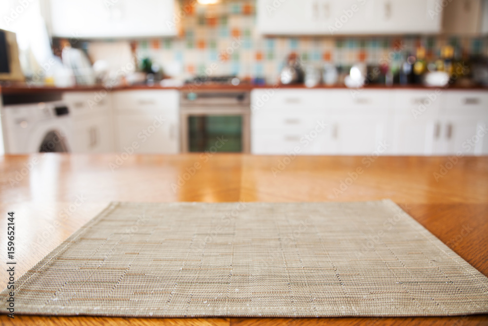 blurred kitchen interior and napkin and desk space blurred kitchen interior and napkin and desk space