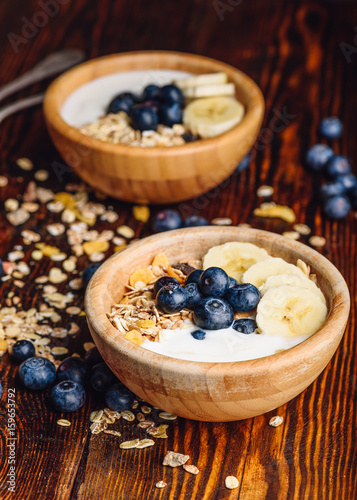 Healthy Breakfast with Granola, Banana and Blueberry.