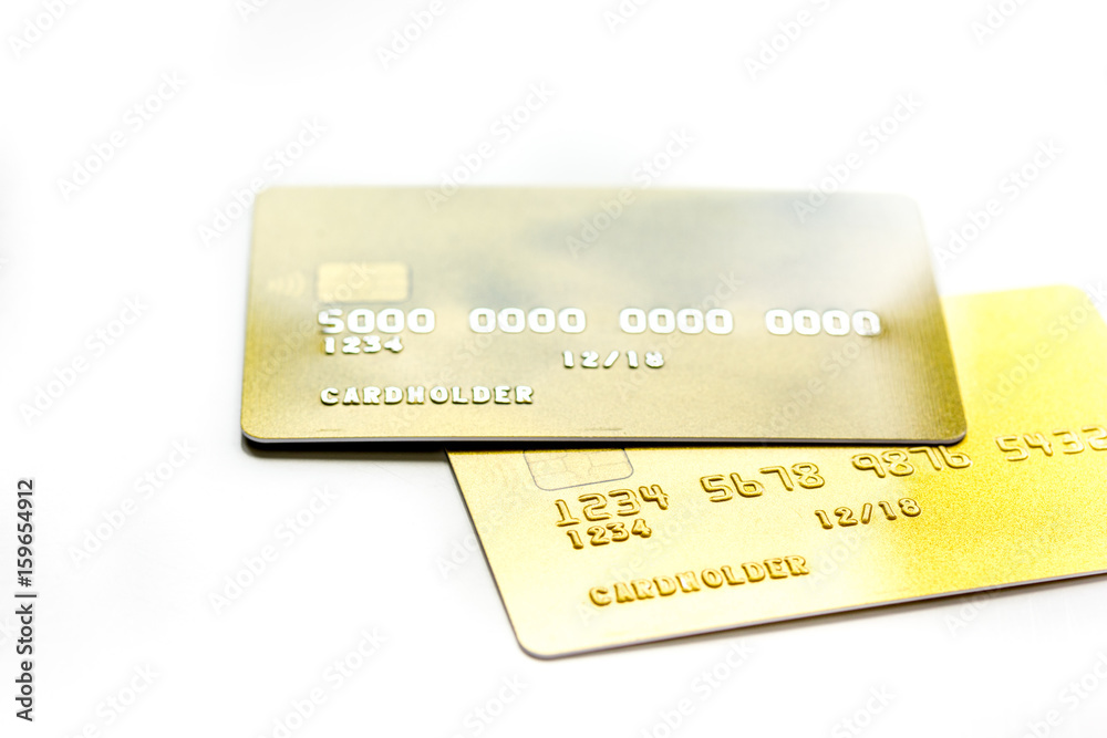 work place with business credit cards for payment on white desk background close up work place with business credit cards for payment on white desk background close up