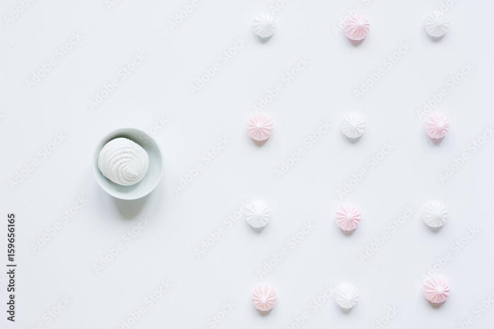 light breakfast with marsh-mallow and coffee on white table background top view light breakfast with marsh-mallow and coffee on white table background top view