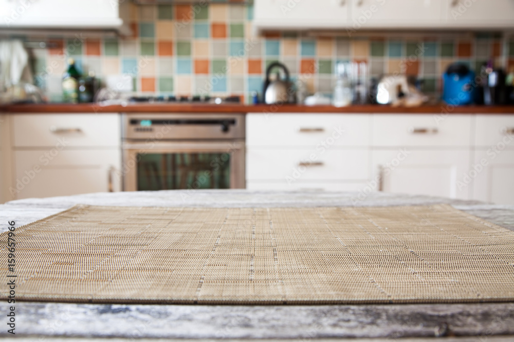 blurred kitchen interior and napkin and desk space blurred kitchen interior and napkin and desk space