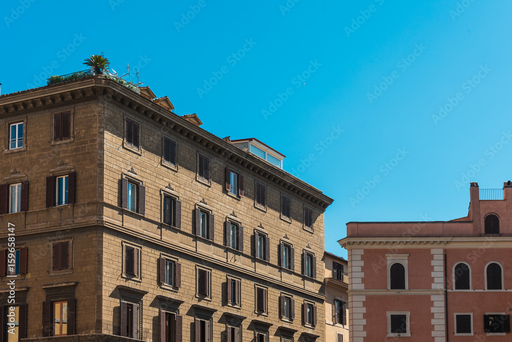 houses at rome with brown facade