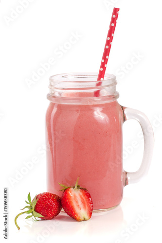 Glass of strawberry smoothie isolated on white background © kolesnikovserg