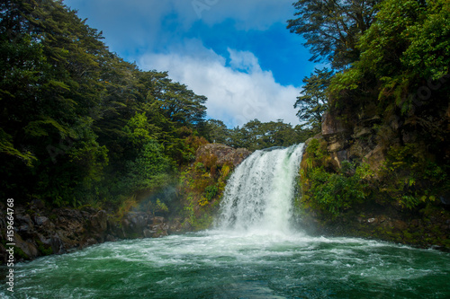 Water from volcano Mt Ruapehu forms Tawhai Falls in Tongariro National Park, New Zealand