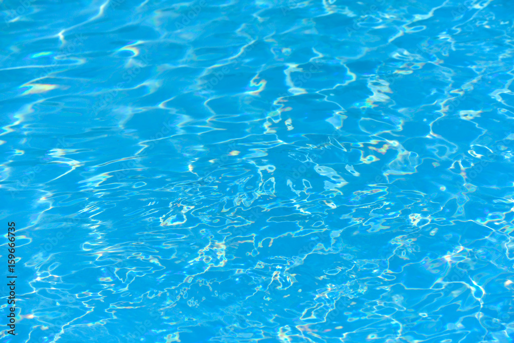 Beautiful ripple wave and blue water surface in swimming pool Beautiful ripple wave and blue water surface in swimming pool