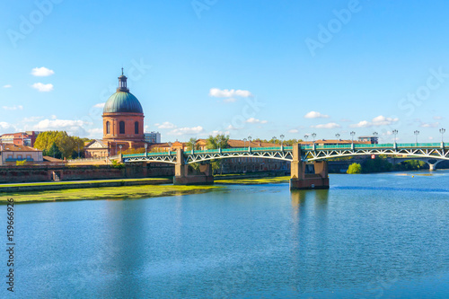 Vew of Saint-Pierre Bridge over Garonne river and Dome de la Grave in Toulouse, France