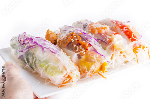 Vietnamese Spring Rolls  large variety of filled  rolled appetizers or dim sum found in East Asian and Southeast Asian cuisine