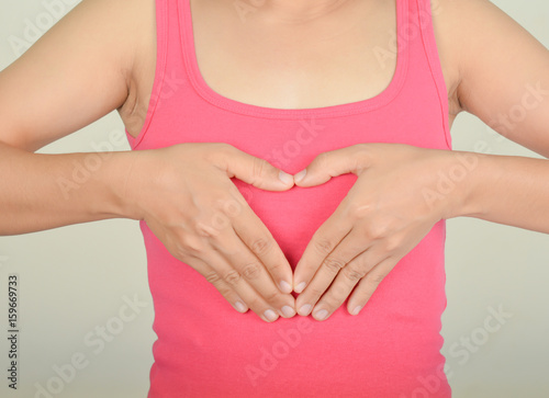 Wallpaper Mural Symbol hand with heart woman   and Pink shirt Torontodigital.ca